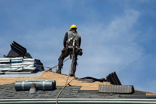 Professional Roofing technician working in Bouton, IA